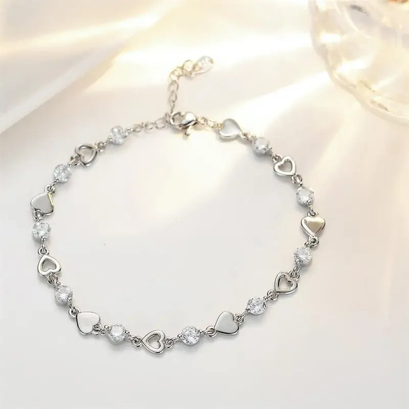 DL 925 Sterling Silver Hollow Heart Zircon Bracelet (Korean Edition)