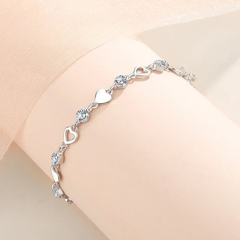 DL 925 Sterling Silver Hollow Heart Zircon Bracelet (Korean Edition)